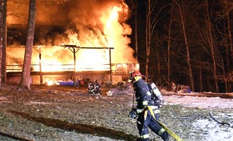 Fire Destroys Warner Log-Cabin