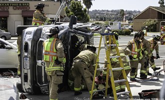 Poway Traffic accident traps 2 in pickup truck