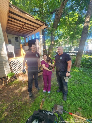 Auburn Firefighters Rescued Dog From Beneath Driveway