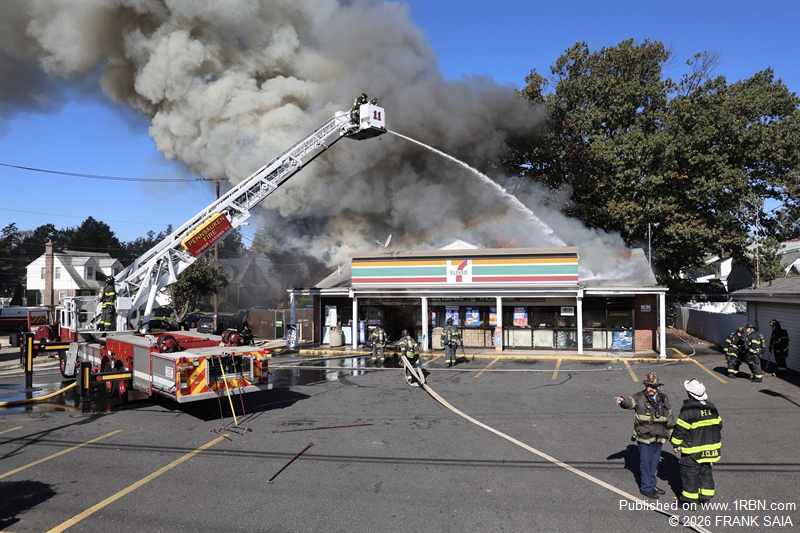 Pennsauken Tower Ladder 11 operates as heavy smoke pushes from the 7-11 convenience store at 6001 Westfield Avenue, Pennsauken, NJ on October 19, 2026.