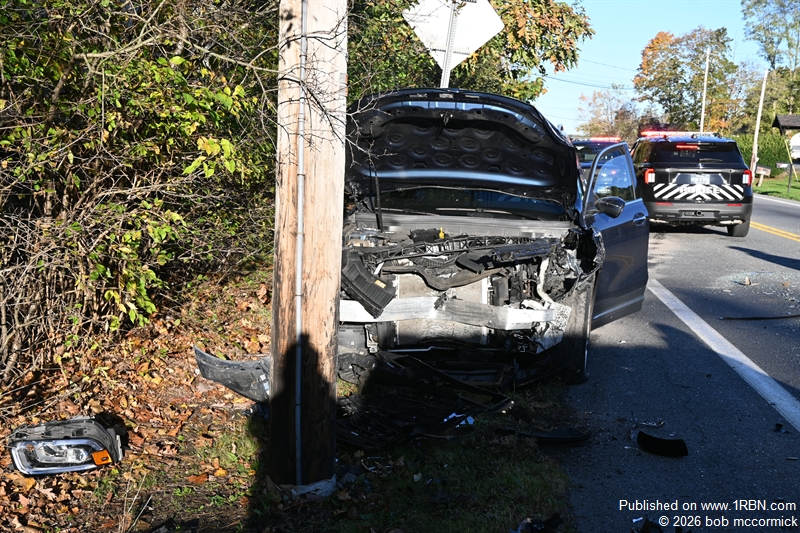 Two vehicle MVA veh strikes pole injuries 