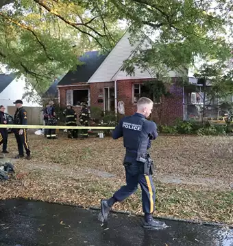 A Haddon Heights police officer establishes a police line at this fatal fire in Haddon Heights, NJ on October 24, 2026.
