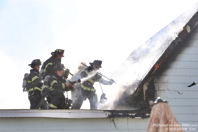 Collingswood and Camden firefighters work to expose and extinguish fire in the rear roof area of the dwelling at 108 Cooper Avenue, Woodlynne, NJ on October 28, 2026.