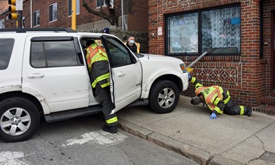 Car Hits Building in Waltham