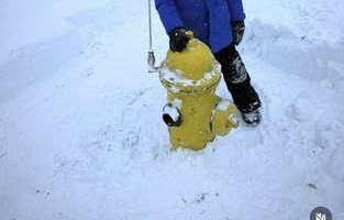 Fifth Graders Dig In to Help Keep Hamburg Safe During Winter Storm