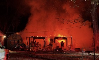 Fire Crews Contain Intense Garage Fire on Persimmons Road