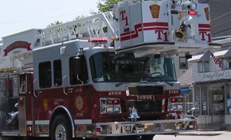 Avon Crews Secure Scene After Vehicle Strikes Residence