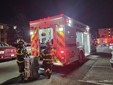 Air 32 of the Woodlawn F. D. on the scene of a 2nd alarm apartment fire