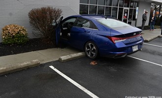 Vehicle into building