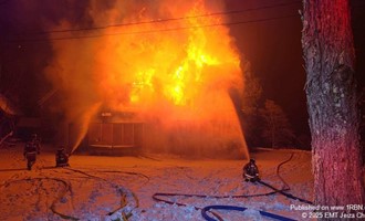Northwood Home Destroyed by Heavy Fire