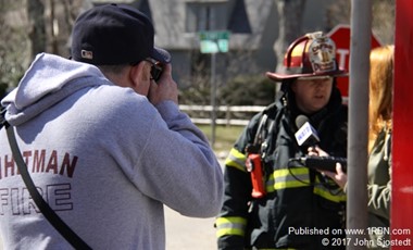 Correspondent Pat Travers at a fire in Duxbury