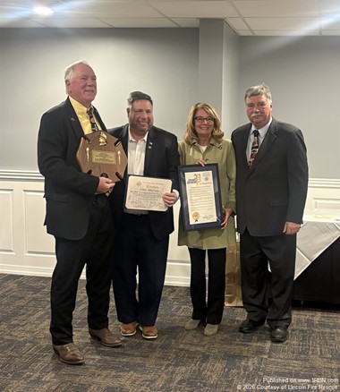 John Murray Receives Distinguished Service Award