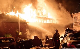 Detroit firefighters battle commercial garage fire