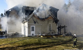 Three-Alarm fire destroys Bedford Home.
