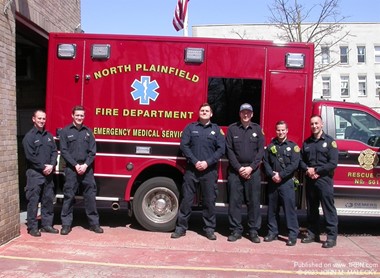 NORTH PLAINFIELD FIREFIGHTERS WITH NEW AMBULANCE