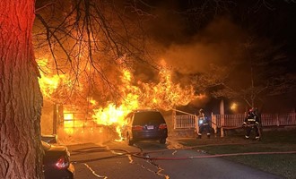 Attached Garage Well Involved on Arrival