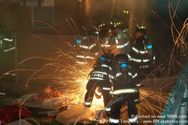 Garfield Firefighters Use Saw