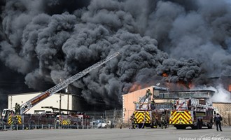 NEWARK WAREHOUSE BURNS IN 3RD ALARM