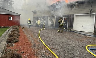 Mutual Aid Crews Battle Working Garage Fire in Wirt