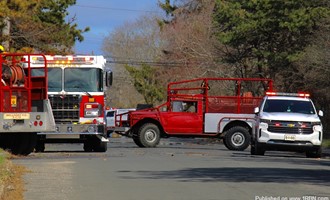 Bellport FD combats Brush Fire
