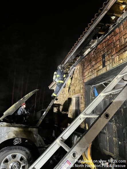 Fast-Moving Vehicle Fire Threatens North Hampton Home