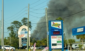 Fast moving brush threatens homes