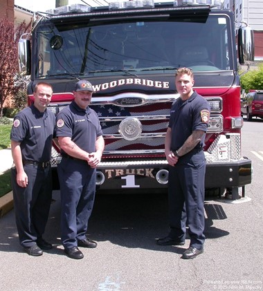 WOODBRIDGE FIREFIGHTERS WITH NEW TRUCK 1