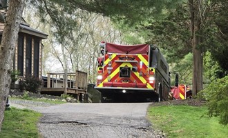 Mystery Surrounds Garage Fire Extinguished Before Firefighters Arrive