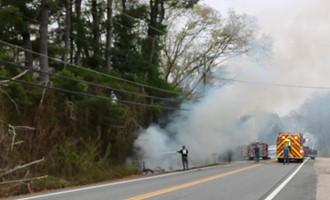Fast-Moving Brush Fire Threatens Wood Line Along Main Street