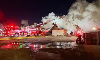 SCRAPYARD FIRE SPARKS BRUSHFIRES, MULTI-AGENCY RESPONSE CONTINUES
