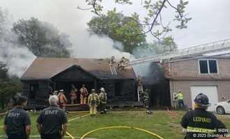 Ledyard Arrives to Well-Involved Home