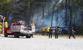Brush Fire in Manchester Threatens Apartments