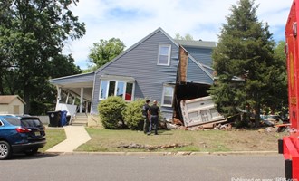 Dump Truck Crashes Into Woodbury Heights House