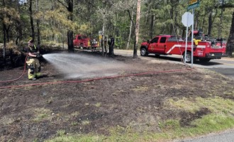 Fast Action Stops Brush Fire from Reaching Woods Along Route 322