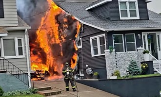 Woodland Park has a car fire with two exposure buildings involved in fire