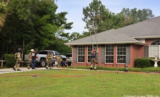 Two Dogs Rescued from Navarre House Fire; One Treated for Smoke Inhalation