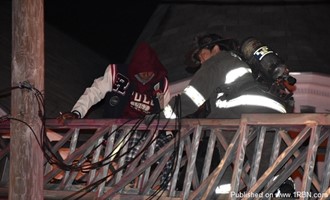 Providence Firefighters Rescue Man from Third Floor of Home