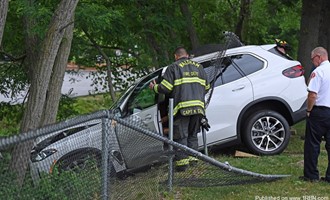 BMW Breaches Fence at Waltham Costco, Prompting Rescue Response