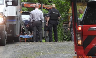Subject pinned between two vehicles