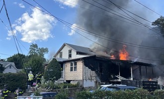 Three-Alarm Blaze Displaces 13 Residents, Injures Teen and Firefighter