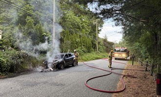 East Great Plain Extinguishes Car Fire