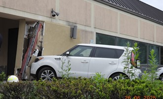 Vehicle into building