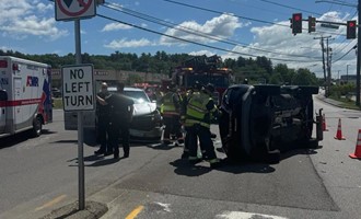 One Injured After Rollover Crash Traps Driver at Amherst Street and Airport Road Intersection