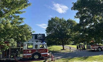 Flames Leap from Brush to Home – Firefighters Act Fast on Benjamin Drive