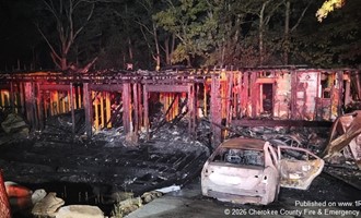 Blocked Access and Heavy Fire Conditions Overcome in Basement Rescue