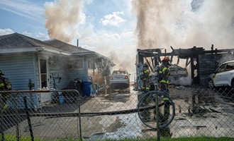 Detached Garage Fire Damages Several Cars and Home in Newington