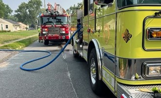 Clayton Firefighters Respond to Garage Fire After Crash Call
