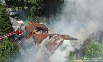 Flames Engulf Shirley Home: Multi-Agency Response Battles Intense Fire