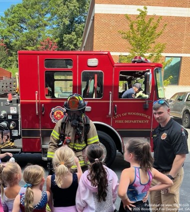 Firefighters Promote Safety Awareness Through Community Camp Visit