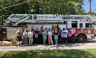 Norwich Donates 120 Backpacks
